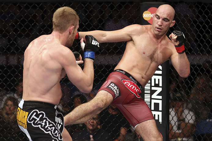 CALGARY, CANADA - JULY 21: (R-L) Brian Ebersole kicks James Head during their welterweight bout at UFC 149 inside the Scotiabank Saddledome on July 21, 2012 in Calgary, Alberta, Canada. (Photo by Nick Laham/Zuffa LLC/Zuffa LLC via Getty Images)