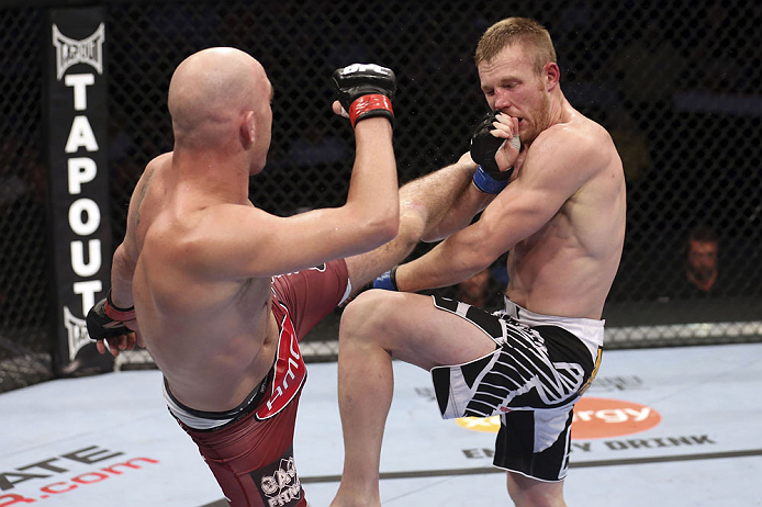 CALGARY, CANADA - JULY 21: (L-R) Brian Ebersole lands a kick to the body of James Head during their welterweight bout at UFC 149 inside the Scotiabank Saddledome on July 21, 2012 in Calgary, Alberta, Canada. (Photo by Nick Laham/Zuffa LLC/Zuffa LLC via G