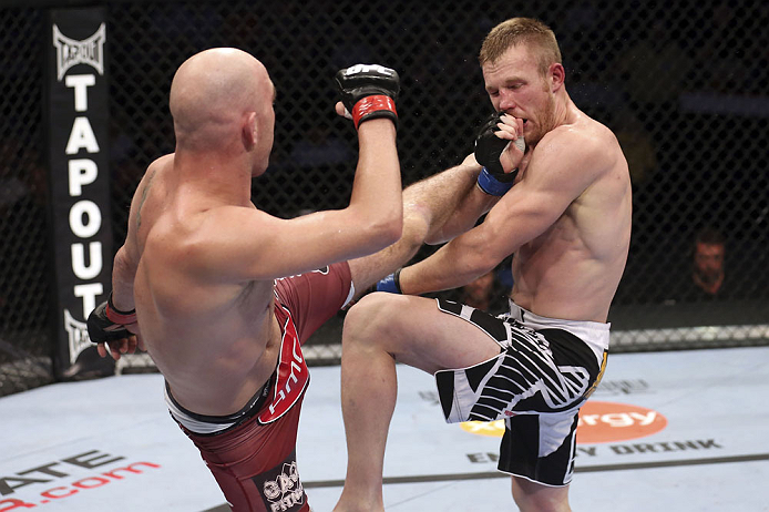 CALGARY, CANADA - JULY 21: (L-R) Brian Ebersole lands a kick to the body of James Head during their welterweight bout at UFC 149 inside the Scotiabank Saddledome on July 21, 2012 in Calgary, Alberta, Canada.  (Photo by Nick Laham/Zuffa LLC/Zuffa LLC via G