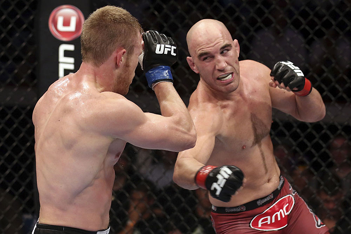 CALGARY, CANADA - JULY 21: (R-L) Brian Ebersole throws a punch at James Head during their welterweight bout at UFC 149 inside the Scotiabank Saddledome on July 21, 2012 in Calgary, Alberta, Canada. (Photo by Nick Laham/Zuffa LLC/Zuffa LLC via Getty Image
