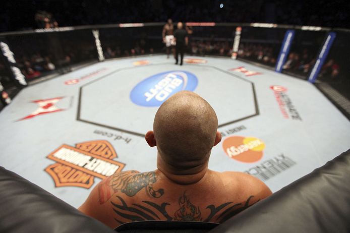 CALGARY, CANADA - JULY 21: Shawn Jordan stands in his corner of the Octagon after he hit Kongo with an accidental elbow below the belt during their heavyweight bout at UFC 149 inside the Scotiabank Saddledome on July 21, 2012 in Calgary, Alberta, Canada.