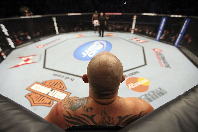 CALGARY, CANADA - JULY 21: Shawn Jordan stands in his corner of the Octagon after he hit Kongo with an accidental elbow below the belt during their heavyweight bout at UFC 149 inside the Scotiabank Saddledome on July 21, 2012 in Calgary, Alberta, Canada. 