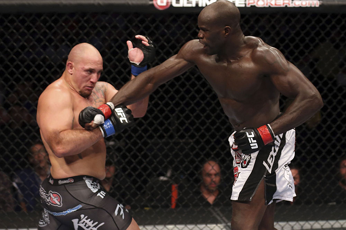 CALGARY, CANADA - JULY 21: (R-L) Cheick Kongo lands a punch to the chest of Shawn Jordan during their heavyweight bout at UFC 149 inside the Scotiabank Saddledome on July 21, 2012 in Calgary, Alberta, Canada.  (Photo by Nick Laham/Zuffa LLC/Zuffa LLC via 