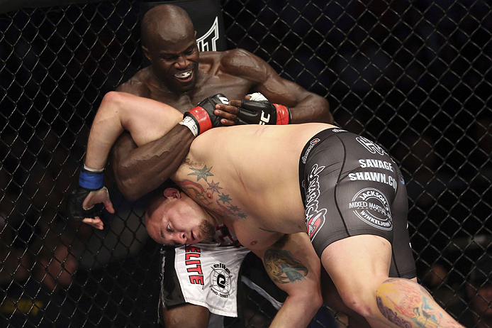 CALGARY, CANADA - JULY 21: (L-R) Cheick Kongo grabs the left arm of Shawn Jordan during their heavyweight bout at UFC 149 inside the Scotiabank Saddledome on July 21, 2012 in Calgary, Alberta, Canada. (Photo by Nick Laham/Zuffa LLC/Zuffa LLC via Getty Im