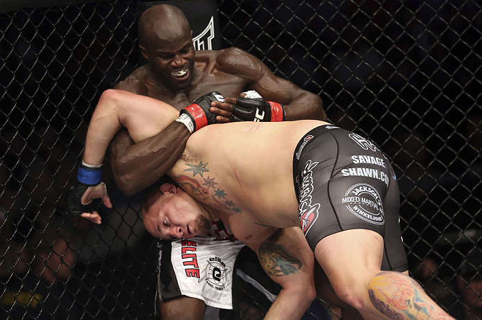 CALGARY, CANADA - JULY 21: (L-R) Cheick Kongo grabs the left arm of Shawn Jordan during their heavyweight bout at UFC 149 inside the Scotiabank Saddledome on July 21, 2012 in Calgary, Alberta, Canada.  (Photo by Nick Laham/Zuffa LLC/Zuffa LLC via Getty Im