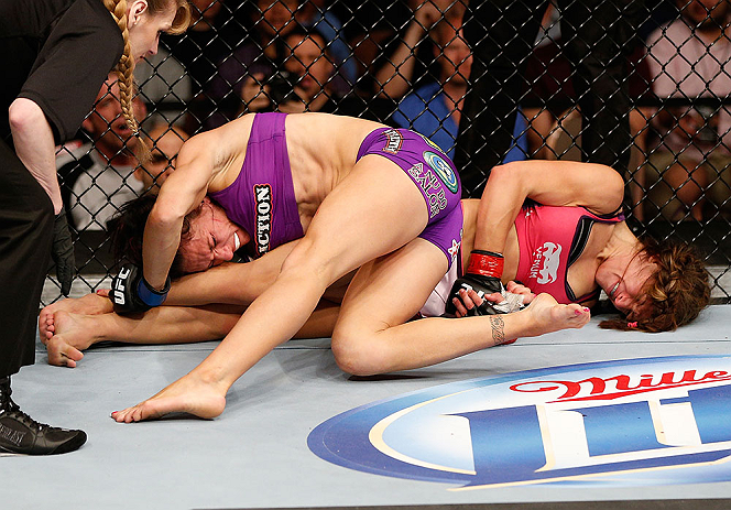 LAS VEGAS, NV - APRIL 13: Miesha Tate (right) attempts to submit Cat Zingano in their bantamweight fight at the Mandalay Bay Events Center on April 13, 2013 in Las Vegas, Nevada. (Photo by Josh Hedges/Zuffa LLC/Zuffa LLC via Getty Images) *** Local C