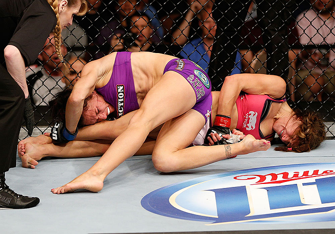 LAS VEGAS, NV - APRIL 13:   Miesha Tate (right) attempts to submit Cat Zingano in their bantamweight fight at the Mandalay Bay Events Center  on April 13, 2013 in Las Vegas, Nevada.  (Photo by Josh Hedges/Zuffa LLC/Zuffa LLC via Getty Images)  *** Local C