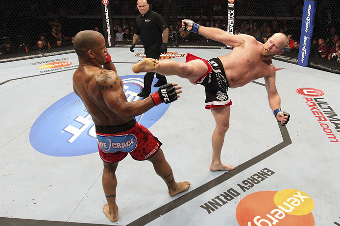 CALGARY, CANADA - JULY 21: (L-R) Hector Lombard exchanges punches with Tim Boetsch during their middleweight bout at UFC 149 inside the Scotiabank Saddledome on July 21, 2012 in Calgary, Alberta, Canada. (Photo by Nick Laham/Zuffa LLC/Zuffa LLC via Gett