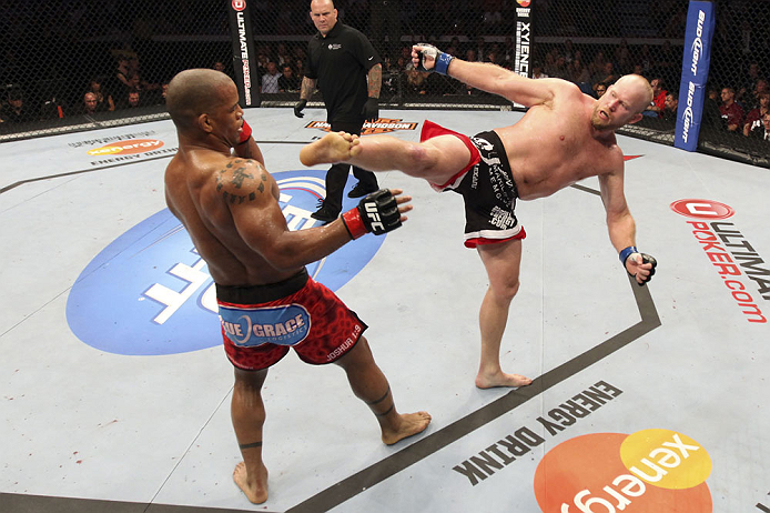 CALGARY, CANADA - JULY 21:  (L-R) Hector Lombard exchanges punches with Tim Boetsch during their middleweight bout at UFC 149 inside the Scotiabank Saddledome on July 21, 2012 in Calgary, Alberta, Canada.  (Photo by Nick Laham/Zuffa LLC/Zuffa LLC via Gett