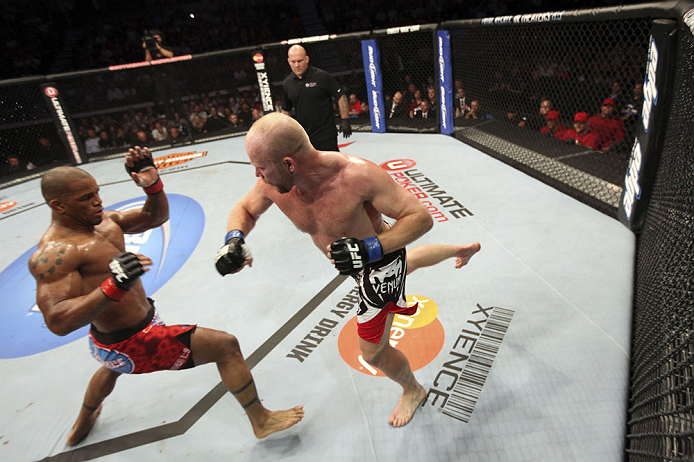 CALGARY, CANADA - JULY 21: (L-R) Hector Lombard exchanges punches with Tim Boetsch during their middleweight bout at UFC 149 inside the Scotiabank Saddledome on July 21, 2012 in Calgary, Alberta, Canada. (Photo by Nick Laham/Zuffa LLC/Zuffa LLC via Gett