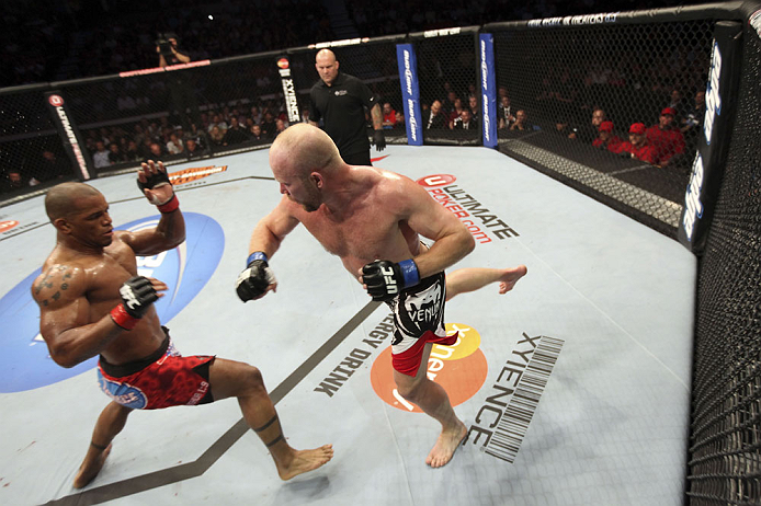 CALGARY, CANADA - JULY 21:  (L-R) Hector Lombard exchanges punches with Tim Boetsch during their middleweight bout at UFC 149 inside the Scotiabank Saddledome on July 21, 2012 in Calgary, Alberta, Canada.  (Photo by Nick Laham/Zuffa LLC/Zuffa LLC via Gett