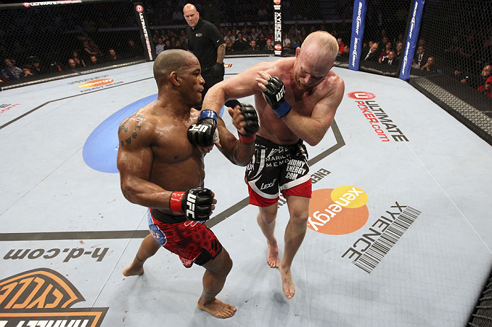 CALGARY, CANADA - JULY 21: (L-R) Hector Lombard exchanges punches with Tim Boetsch during their middleweight bout at UFC 149 inside the Scotiabank Saddledome on July 21, 2012 in Calgary, Alberta, Canada. (Photo by Nick Laham/Zuffa LLC/Zuffa LLC via Gett