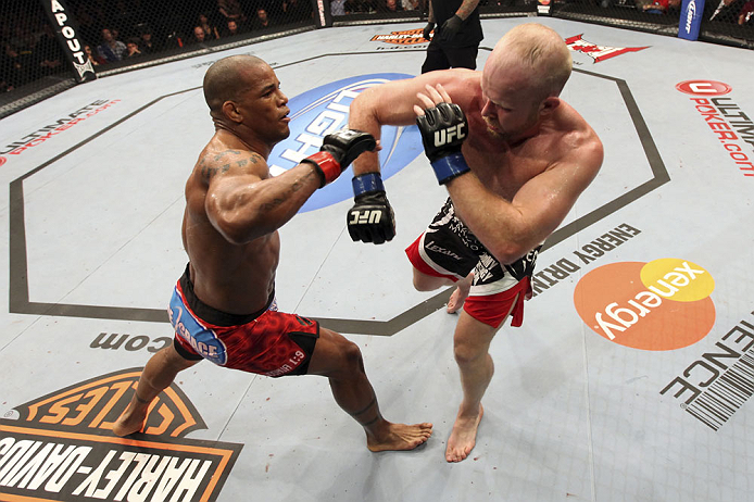CALGARY, CANADA - JULY 21: (L-R) Hector Lombard exchanges punches with Tim Boetsch during their middleweight bout at UFC 149 inside the Scotiabank Saddledome on July 21, 2012 in Calgary, Alberta, Canada. (Photo by Nick Laham/Zuffa LLC/Zuffa LLC via Gett