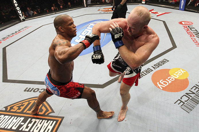 CALGARY, CANADA - JULY 21:  (L-R) Hector Lombard exchanges punches with Tim Boetsch during their middleweight bout at UFC 149 inside the Scotiabank Saddledome on July 21, 2012 in Calgary, Alberta, Canada.  (Photo by Nick Laham/Zuffa LLC/Zuffa LLC via Gett