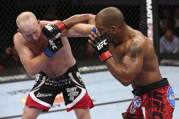 CALGARY, CANADA - JULY 21: (R-L) Hector Lombard throws a punch at Tim Boetsch during their middleweight bout at UFC 149 inside the Scotiabank Saddledome on July 21, 2012 in Calgary, Alberta, Canada. (Photo by Nick Laham/Zuffa LLC/Zuffa LLC via Getty Imag