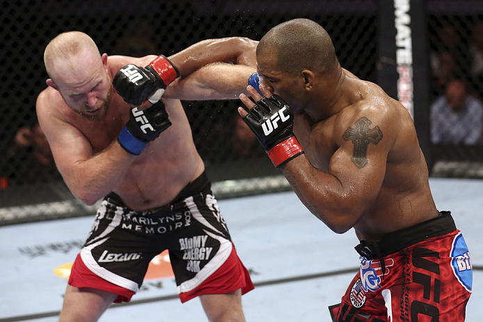 CALGARY, CANADA - JULY 21: (R-L) Hector Lombard throws a punch at Tim Boetsch during their middleweight bout at UFC 149 inside the Scotiabank Saddledome on July 21, 2012 in Calgary, Alberta, Canada.  (Photo by Nick Laham/Zuffa LLC/Zuffa LLC via Getty Imag