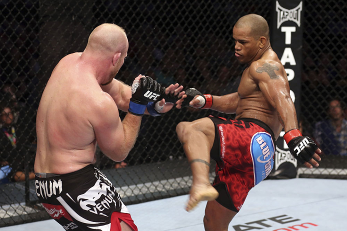 CALGARY, CANADA - JULY 21: (R-L) Hector Lombard kicks at Tim Boetsch during their middleweight bout at UFC 149 inside the Scotiabank Saddledome on July 21, 2012 in Calgary, Alberta, Canada.  (Photo by Nick Laham/Zuffa LLC/Zuffa LLC via Getty Images)