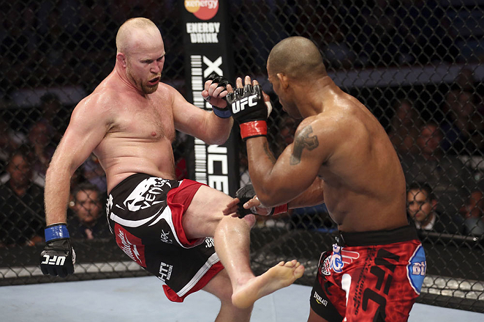CALGARY, CANADA - JULY 21: (L-R) Tim Boetsch kicks Hector Lombard during their middleweight bout at UFC 149 inside the Scotiabank Saddledome on July 21, 2012 in Calgary, Alberta, Canada. (Photo by Nick Laham/Zuffa LLC/Zuffa LLC via Getty Images)