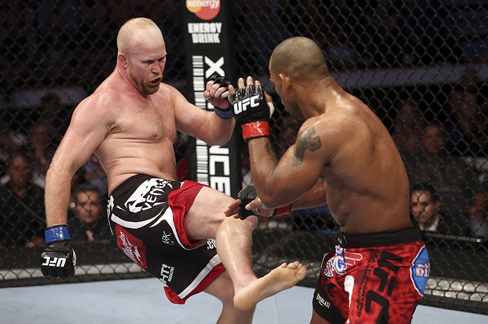 CALGARY, CANADA - JULY 21: (L-R) Tim Boetsch kicks Hector Lombard during their middleweight bout at UFC 149 inside the Scotiabank Saddledome on July 21, 2012 in Calgary, Alberta, Canada.  (Photo by Nick Laham/Zuffa LLC/Zuffa LLC via Getty Images)