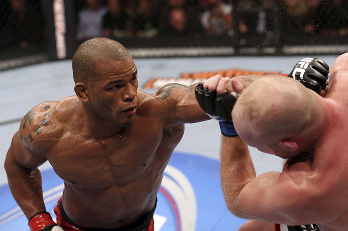 CALGARY, CANADA - JULY 21: (L-R) Hector Lombard throws a punch at Tim Boetsch during their middleweight bout at UFC 149 inside the Scotiabank Saddledome on July 21, 2012 in Calgary, Alberta, Canada. (Photo by Nick Laham/Zuffa LLC/Zuffa LLC via Getty Imag