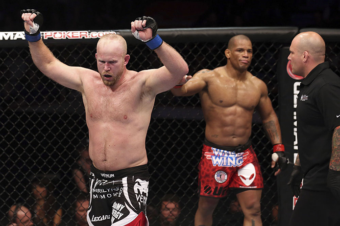 CALGARY, CANADA - JULY 21: (L-R) Tim Boetsch celebrates after three rounds fighting against Hector Lombard during their middleweight bout at UFC 149 inside the Scotiabank Saddledome on July 21, 2012 in Calgary, Alberta, Canada. (Photo by Nick Laham/Zuffa