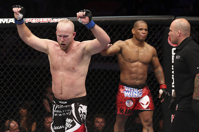 CALGARY, CANADA - JULY 21: (L-R) Tim Boetsch celebrates after three rounds fighting against Hector Lombard during their middleweight bout at UFC 149 inside the Scotiabank Saddledome on July 21, 2012 in Calgary, Alberta, Canada.  (Photo by Nick Laham/Zuffa