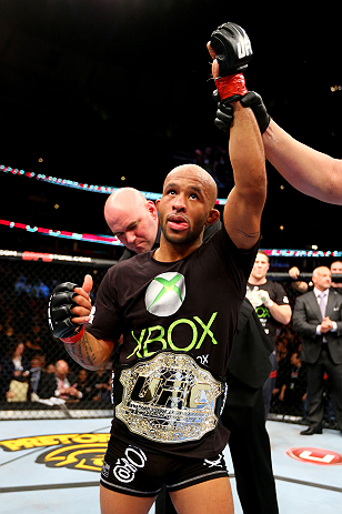 CHICAGO, IL - JANUARY 26: Demetrious Johnson celebrates defeating John Dodson during thier Flyweight Championship Bout part of UFC on FOX at United Center on January 26, 2013 in Chicago, Illinois. (Photo by Al Bello/Zuffa LLC/Zuffa LLC Via Getty Images)