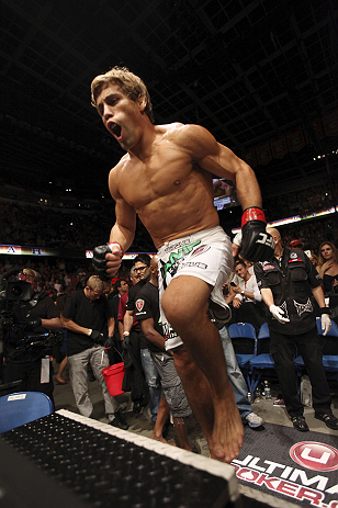 CALGARY, CANADA - JULY 21:  Urijah Faber enters the Octagon prior to facing Renan Barao during their UFC interim bantamweight championship bout at UFC 149 inside the Scotiabank Saddledome on July 21, 2012 in Calgary, Alberta, Canada.  (Photo by Nick Laham