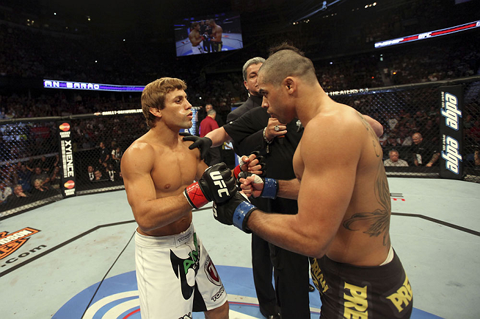 CALGARY, CANADA - JULY 21: (L-R) Urijah Faber faces off against Renan Barao during their UFC interim bantamweight championship bout at UFC 149 inside the Scotiabank Saddledome on July 21, 2012 in Calgary, Alberta, Canada. (Photo by Nick Laham/Zuffa LLC/Z