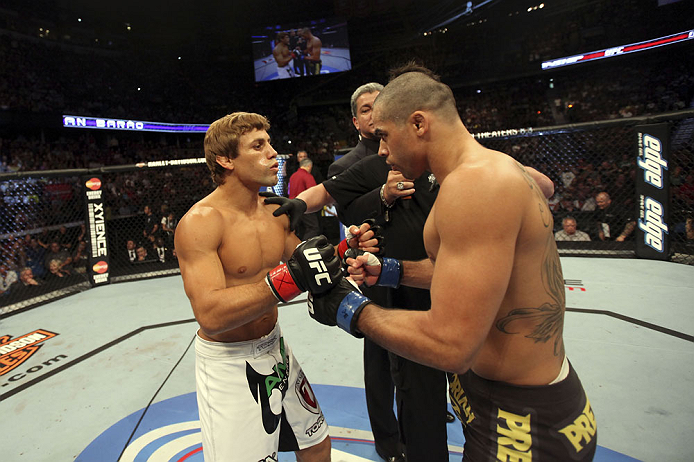 CALGARY, CANADA - JULY 21: (L-R) Urijah Faber faces off against Renan Barao during their UFC interim bantamweight championship bout at UFC 149 inside the Scotiabank Saddledome on July 21, 2012 in Calgary, Alberta, Canada.  (Photo by Nick Laham/Zuffa LLC/Z