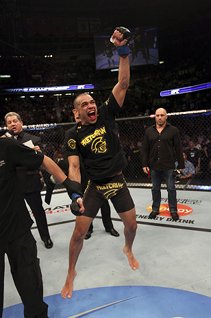 CALGARY, CANADA - JULY 21:  Renan Barao celebrates his victory over Urijah Faber during their UFC interim bantamweight championship bout at UFC 149 inside the Scotiabank Saddledome on July 21, 2012 in Calgary, Alberta, Canada.  (Photo by Nick Laham/Zuffa 