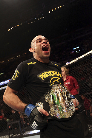 CALGARY, CANADA - JULY 21:  Renan Barao celebrates his victory over Urijah Faber during their UFC interim bantamweight championship bout at UFC 149 inside the Scotiabank Saddledome on July 21, 2012 in Calgary, Alberta, Canada.  (Photo by Nick Laham/Zuffa 