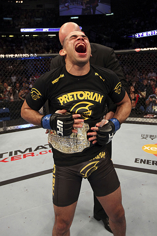 CALGARY, CANADA - JULY 21: Renan Barao celebrates his victory over Urijah Faber during their UFC interim bantamweight championship bout at UFC 149 inside the Scotiabank Saddledome on July 21, 2012 in Calgary, Alberta, Canada. (Photo by Nick Laham/Zuffa
