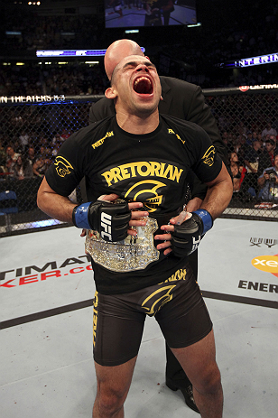 CALGARY, CANADA - JULY 21:  Renan Barao celebrates his victory over Urijah Faber during their UFC interim bantamweight championship bout at UFC 149 inside the Scotiabank Saddledome on July 21, 2012 in Calgary, Alberta, Canada.  (Photo by Nick Laham/Zuffa 