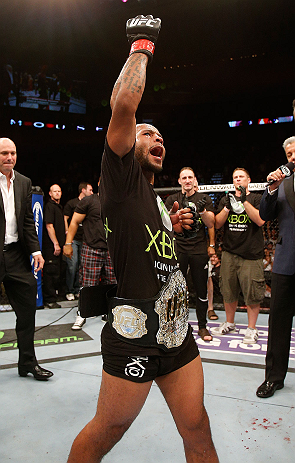 SEATTLE, WA - JULY 27: Demetrious Johnson reacts to his victory over John Moraga in their flyweight championship bout during the UFC on FOX event at Key Arena on July 27, 2013 in Seattle, Washington. (Photo by Josh Hedges/Zuffa LLC/Zuffa LLC via Getty Ima