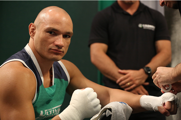 SAO PAULO, BRAZIL - FEBRUARY 4:  Team Sonnen fighter Vitor Mirande gets his hands wrapped before facing  Team Wanderlei fighter Antonio Branjao in their heavyweight fight during season three of The Ultimate Fighter Brazil on February 4, 2014 in Sao Paulo,