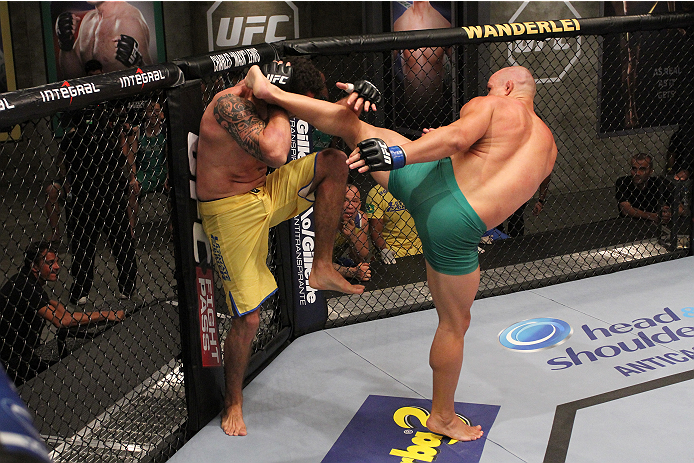 SAO PAULO, BRAZIL - FEBRUARY 4:  (R-L) Team Sonnen fighter Vitor Mirande kicks Team Wanderlei fighter Antonio Branjao in their heavyweight fight during season three of The Ultimate Fighter Brazil on February 4, 2014 in Sao Paulo, Brazil. (Photo by Luiz Pi