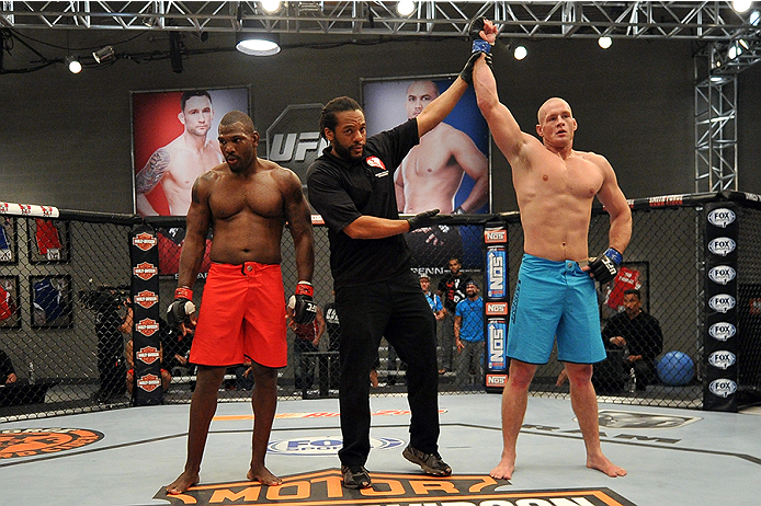 LAS VEGAS, NV - OCTOBER 29: (R-L) Team Penn fighter Daniel Spohn celebrates after defeating Team Edgar fighter Todd Monaghan in their preliminary fight during filming of season nineteen of The Ultimate Fighter on October 29, 2013 in Las Vegas, Nevada. (P