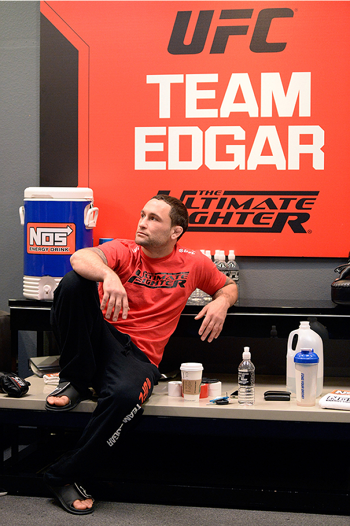 LAS VEGAS, NV - OCTOBER 29: Coach Frankie Edgar sits in the locker room before his fighter Todd Monaghan faces Team Penn fighter Daniel Spohn in their preliminary fight during filming of season nineteen of The Ultimate Fighter on October 29, 2013 in Las