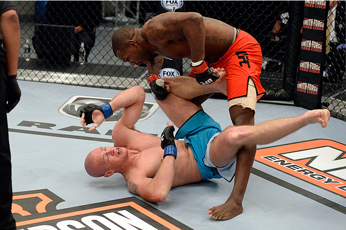 LAS VEGAS, NV - OCTOBER 29: (R-L) Team Edgar fighter Todd Monaghan punches Team Penn fighter Daniel Spohn in their preliminary fight during filming of season nineteen of The Ultimate Fighter on October 29, 2013 in Las Vegas, Nevada. (Photo by Jeff Bottar