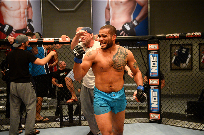 LAS VEGAS, NV - NOVEMBER 8:  Team Penn fighter Roger Zapata celebrates after defeating team Edgar fighter Joseph Stephens in their preliminary fight during filming of season nineteen of The Ultimate Fighter on November 8, 2013 in Las Vegas, Nevada. (Photo