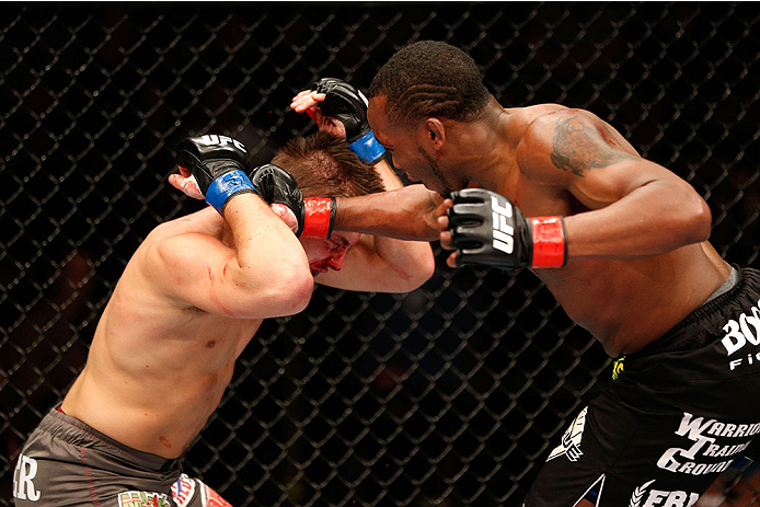 LAS VEGAS, NV - NOVEMBER 30:  (R-L) Sean Spencer punches Drew Dober in their welterweight fight during The Ultimate Fighter season 18 live finale inside the Mandalay Bay Events Center on November 30, 2013 in Las Vegas, Nevada. (Photo by Josh Hedges/Zuffa 