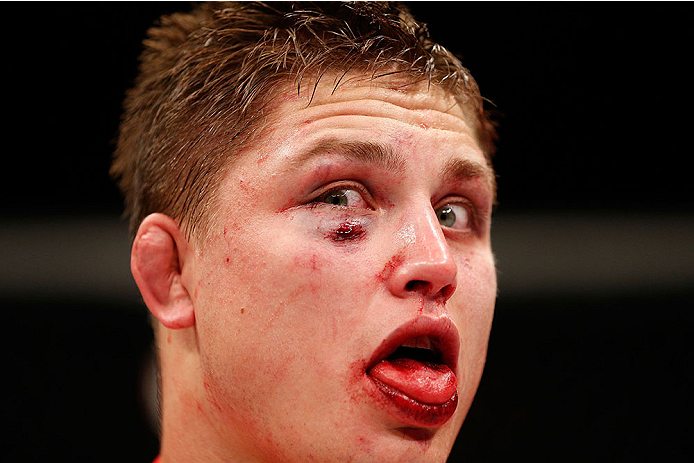 LAS VEGAS, NV - NOVEMBER 30:  Drew Dober reacts after his fight against Sean Spencer in their welterweight fight during The Ultimate Fighter season 18 live finale inside the Mandalay Bay Events Center on November 30, 2013 in Las Vegas, Nevada. (Photo by J