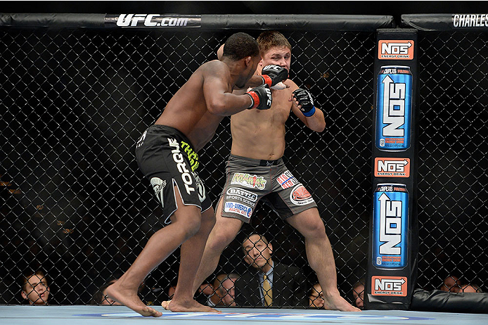 LAS VEGAS, NV - NOVEMBER 30: (L-R) Sean Spencer punches Drew Dober in their welterweight fight during The Ultimate Fighter season 18 live finale inside the Mandalay Bay Events Center on November 30, 2013 in Las Vegas, Nevada. (Photo by Jeff Bottari/Zuffa