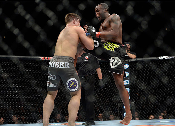 LAS VEGAS, NV - NOVEMBER 30:  (R-L) Sean Spencer lands a knee on Drew Dober in their welterweight fight during The Ultimate Fighter season 18 live finale inside the Mandalay Bay Events Center on November 30, 2013 in Las Vegas, Nevada. (Photo by Jeff Botta