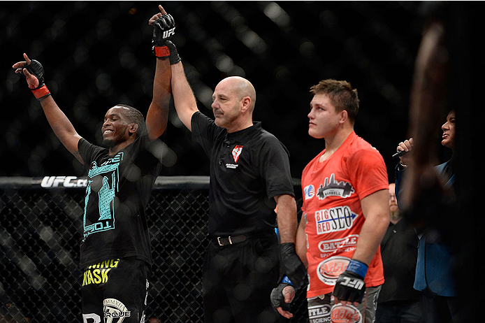 LAS VEGAS, NV - NOVEMBER 30: (L-R) Sean Spencer celebrates after defeating Drew Dober in their welterweight fight during The Ultimate Fighter season 18 live finale inside the Mandalay Bay Events Center on November 30, 2013 in Las Vegas, Nevada. (Photo by