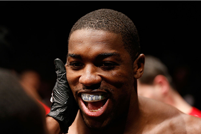 LAS VEGAS, NV - NOVEMBER 30: Walt Harris walks into the arena before his fight against Jared Rosholt in their heavyweight fight during The Ultimate Fighter season 18 live finale inside the Mandalay Bay Events Center on November 30, 2013 in Las Vegas, Nev