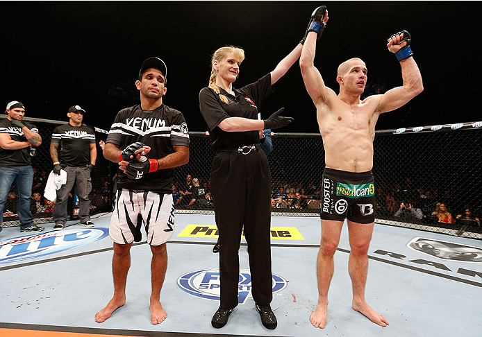 LAS VEGAS, NV - NOVEMBER 30:  (R-L) Tom Niinimaki celebrates after defeating Rani Yahya in their featherweight fight during The Ultimate Fighter season 18 live finale inside the Mandalay Bay Events Center on November 30, 2013 in Las Vegas, Nevada. (Photo 