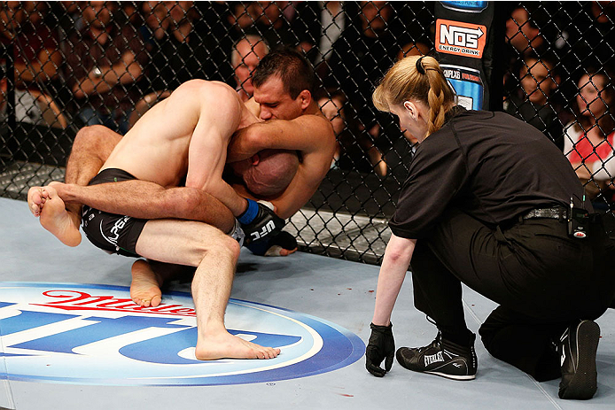 LAS VEGAS, NV - NOVEMBER 30:  Tom Niinimaki (black shorts) is controlled by Rani Yahya (white shorts) in their featherweight fight during The Ultimate Fighter season 18 live finale inside the Mandalay Bay Events Center on November 30, 2013 in Las Vegas, N