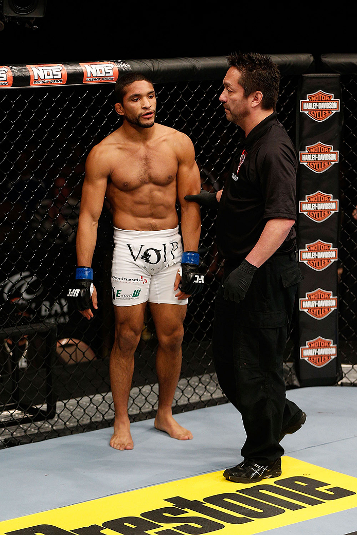 LAS VEGAS, NV - NOVEMBER 30: Maximo Blanco (L) is talked to by referee Mario Yamasaki (R) after Blanco landed an illegal knee to the head of Akira Corassani in their featherweight fight during The Ultimate Fighter season 18 live finale inside the Mandala